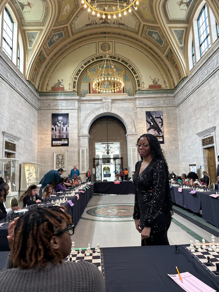 Jessica playing 27 girls in a simultaneous exhibition hosted at the stunning Detroit Institute of Arts.