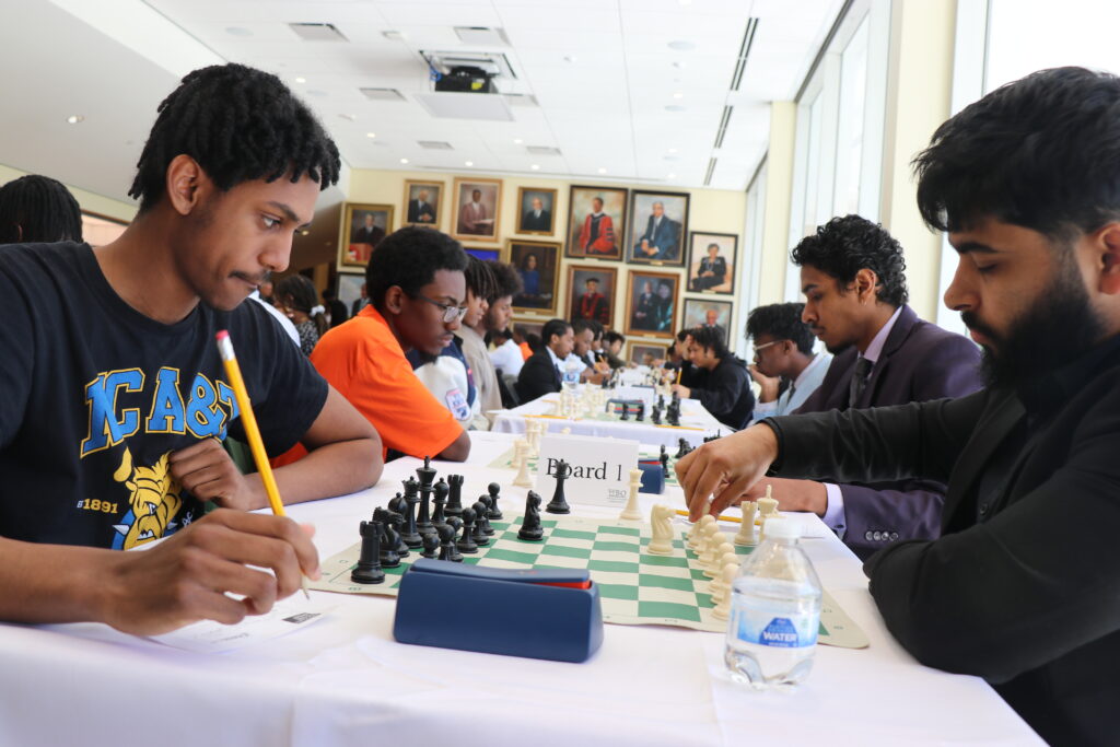Akindele Omotosho vs. Samir Acharya; Caleb Parker vs. Malik Castro-Devarona
Photo by Daaim Shabazz/The Chess Drum