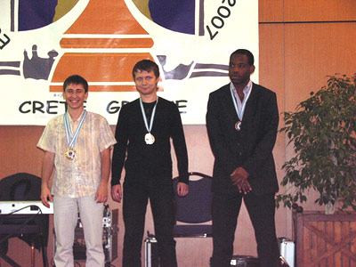 5th board medal winners, Dmitry Jakovenko (Russia - Silver), Alexander Areshchenko (Ukraine - Bronze), Pontus Carlsson (Sweden - Gold) Photo by greekchess.com.