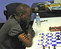 FM Warren Elliott at Cameron Open. Photo by Jamaican ambassadors Chess Academy.