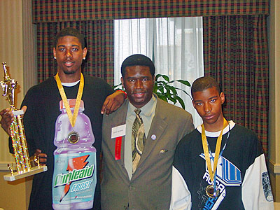 Aaron Porter (L) and Xavier Graham (R) pose with Orrin C. Hudson of BeSomeone, Inc. Copyright   2006, BeSomeone, Inc.