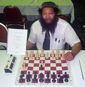 Bernard Parham showing his manual on the Matrix System during the 2003 World Open. Photo by Daaim Shabazz/The Chess Drum