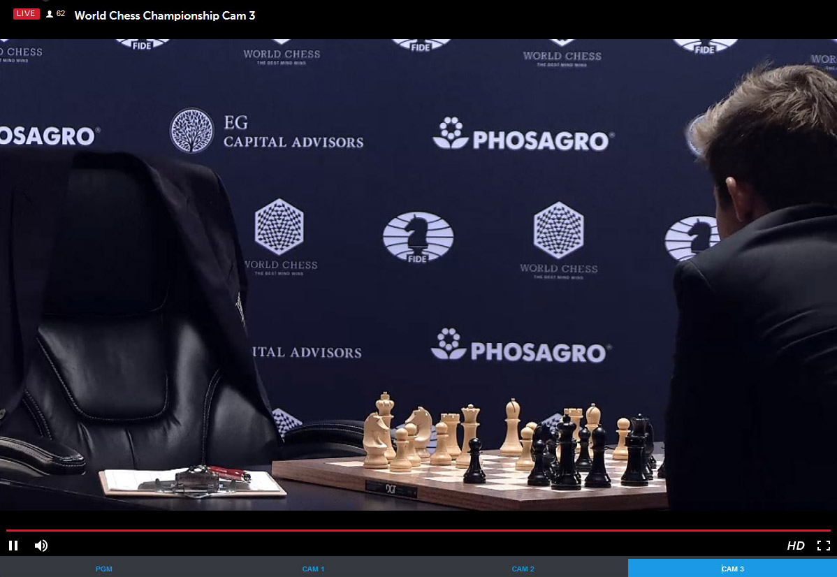 Carlsen ponders move after Karjakin's 15.Qf3