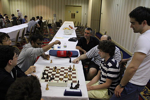 Consultation Chess still going on with more players joining in. Photo by Daaim Shabazz.